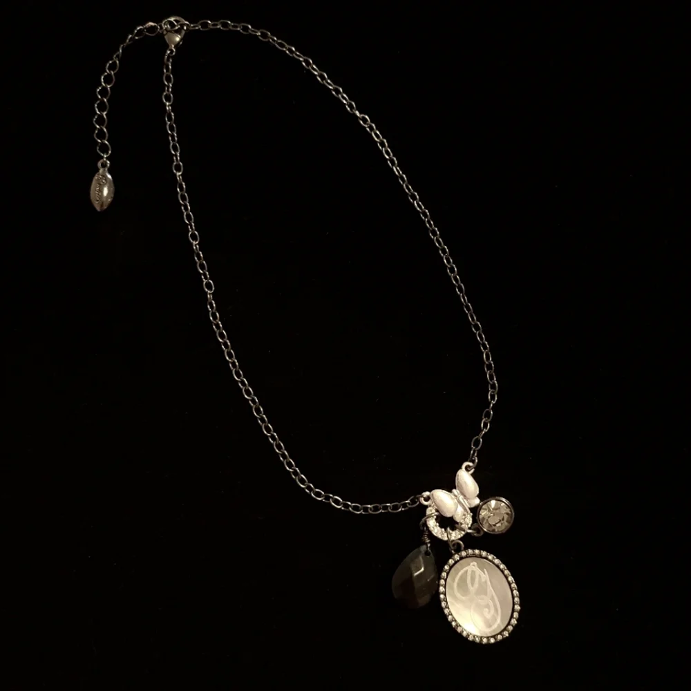 Guess Black and Silver Butterfly Mother of Pearl Necklace - Picture 1 of 2